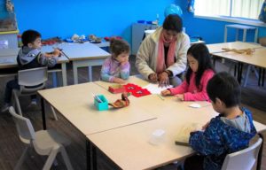 Beverly Montessori children doing art activity