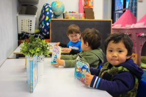Kids reading at Beverly Montessori